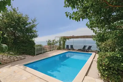 Image de Superbe appartement à Duce avec WiFi