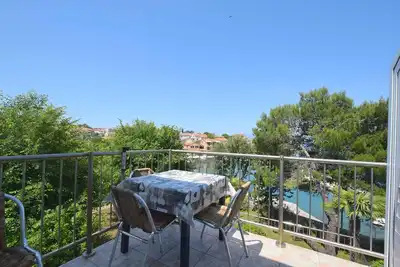 Image de Appartement de vacances avec balcon et vue sur la mer
