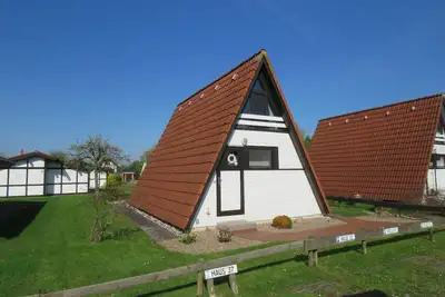 Image de Maison de vacances 22 Wigwam 53qm pour max. 4 personnes sans animaux domestiques - Ferienhaus Wigwam dans le village de vacances Altes