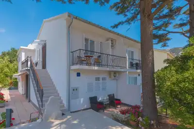 Image de Appartement de vacances avec balcon dans un environnement calme