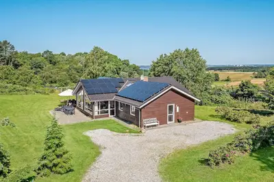 Image de Belle maison à Knebel avec sauna