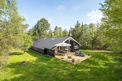 Image de Belle maison à Knebel avec sauna