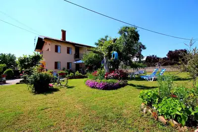 Image de Appartement de vacances avec grand jardin