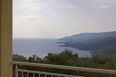 Image de Appartement de vacances avec de belles vues sur la mer, air conditionné et WiFi