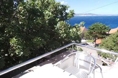 Image de Appartement de vacances avec balcon et vue mer près de la plage