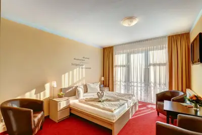 Image de Appartement avec kitchenette - Aparthotel Strandhus Trivago Award \"meilleur hôtel 3 étoiles\"