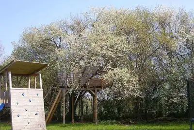 Image de Appartement de vacances avec chauffage au sol, cheminée et terrasse