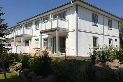 Image de acier arc de vacances, 70m² avec terrasse - tôle d'acier Appartement