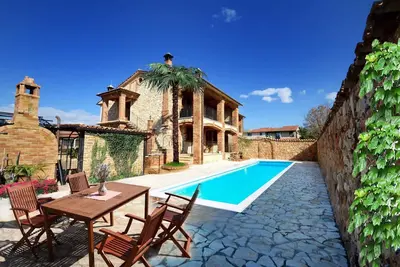 Image de Appartement de vacances avec piscine et le style toscan