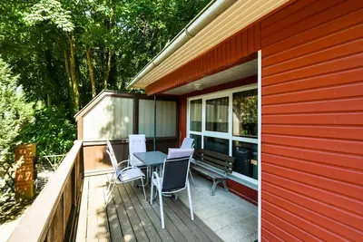 Image de Ferienbungalow B - bungalows de vacances en bordure de la forêt de hêtres dans la station balnéaire de Sellin, dans la mer Baltique