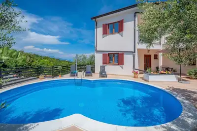 Image de Appartement de vacances avec piscine extérieure, sauna et bain à remous