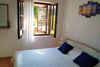 Image de Appartement de vacances avec de l'air conditionné et un accès Internet