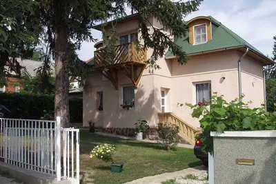 Image de Appartement de vacances avec climatisation, balcon et jardin