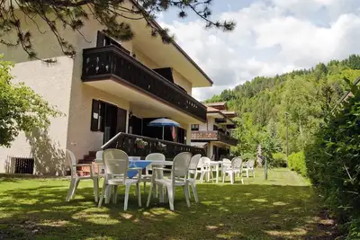 Image de Appartement de vacances avec un balcon donnant sur les montagnes
