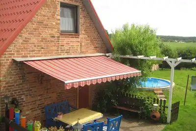 Image de Maison de vacances avec terrasse et piscine