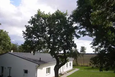 Image de Appartement de vacances avec chauffage au sol, cheminée et terrasse