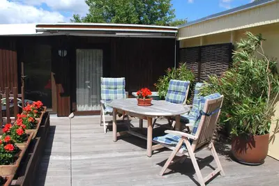 Image de Ferienappartement Avoir - appartements de vacances sous le toit de chaume donnant sur le lac