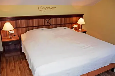 Image de Ferienappartement Sonnenstrahl avec sauna et balcon - appartements de manoir avec cheminée, sauna et
