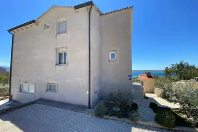 Image de Appartement de vacances avec de l'air conditionné et un accès Internet