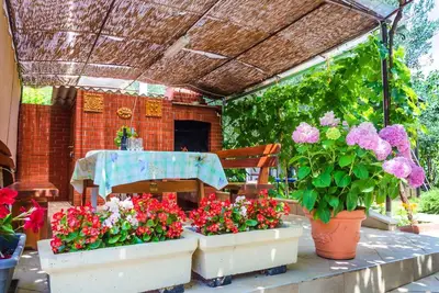 Image de Maison de vacances avec air conditionné et terrasse avec barbecue