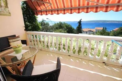 Image de Appartement de vacances avec climatisation et vue sur la mer
