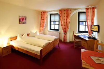 Image de Chambre triple -. Hôtel au marché