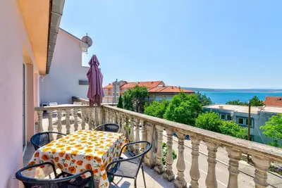 Image de Appartement de vacances avec climatisation et vue sur la mer