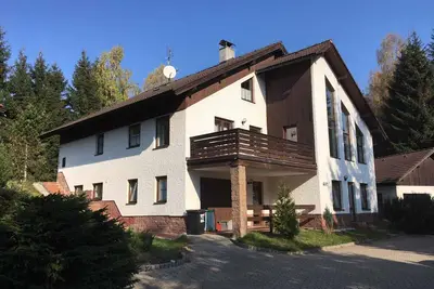 Image de Appartement de vacances avec une entrée privée dans la station de ski