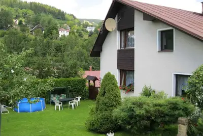 Image de Appartement de vacances avec grand jardin et piscine en plein air