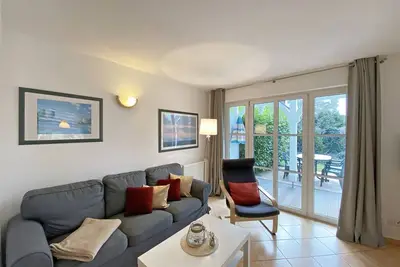 Image de Haus RĂĽgenwelle - Whg 01 Ec avec terrasse - W: Haus RĂĽgenwelle avec 4 appartements confortables
