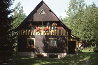 Image de Maison de vacances avec poêle dans un environnement calme