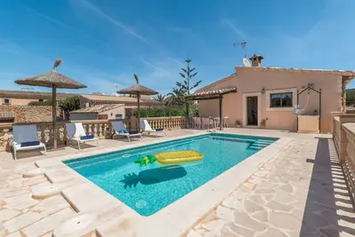 Image de Sa Madoneta charming holiday house with stunning views and swimming pool in SantanyĂ