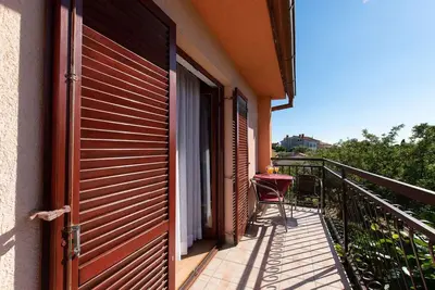 Image de Appartement de vacances avec télévision équipée du câble à seulement 400 m de la plage