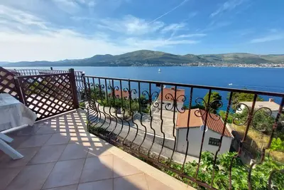 Image de Appartement de vacances avec balcon et vue sur la mer