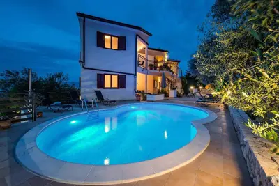 Image de Appartement de vacances avec piscine extérieure, sauna et bain à remous
