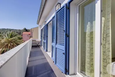 Image de Appartement de vacances avec de l'air conditionné et un accès Internet