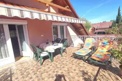 Image de Appartement de vacances avec balcon et beau jardin