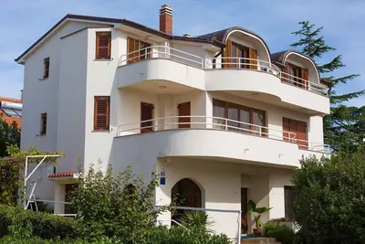 Image de Appartement de vacances avec air conditionné et vue sur la mer