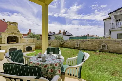 Image de Appartement de vacances avec jardin et air conditionné