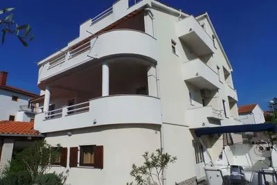 Image de Appartement de vacances avec barbecue, jardin, climatisation et Wi-Fi