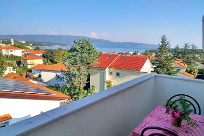 Image de Appartement de vacances avec vue sur la mer, balcon, Wi-Fi et climatisation