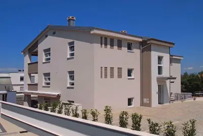 Image de Appartement de vacances avec de l'air conditionné et un accès Internet