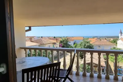 Image de Appartement de vacances avec accès à Internet et de la climatisation