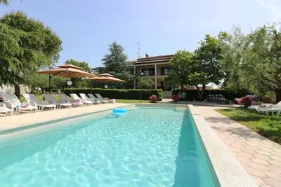 Image de Appartement de vacances dans des maisons jumelles avec piscine