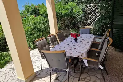 Image de Appartement de vacances avec jardin, climatisation, Internet et télévision par satellite