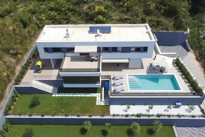 Image de Maison en bord de mer à Omis avec sauna