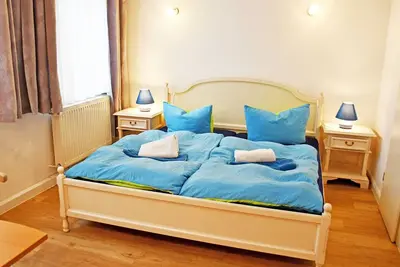 Image de 03 Chambre à plusieurs lits (2 pièces) - Villa dans la station balnéaire de Baabe