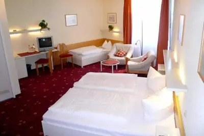 Image de Salle familiale avec Wc et douche / baignoire pour max. 4 Pers. - Akzent Hôtel restaurant Höhenblick