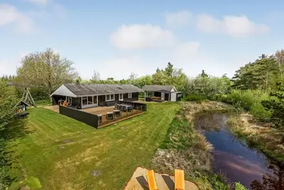 Image de Belle maison Ă Tarm avec sauna