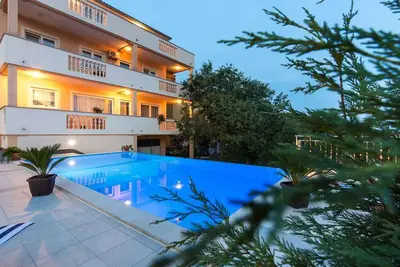 Image de Appartement de vacances avec air conditionné et vue sur la mer